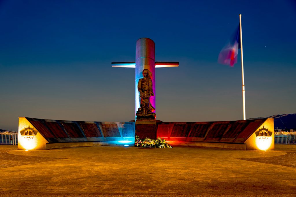 Monument with french flag and blue, red, white lights